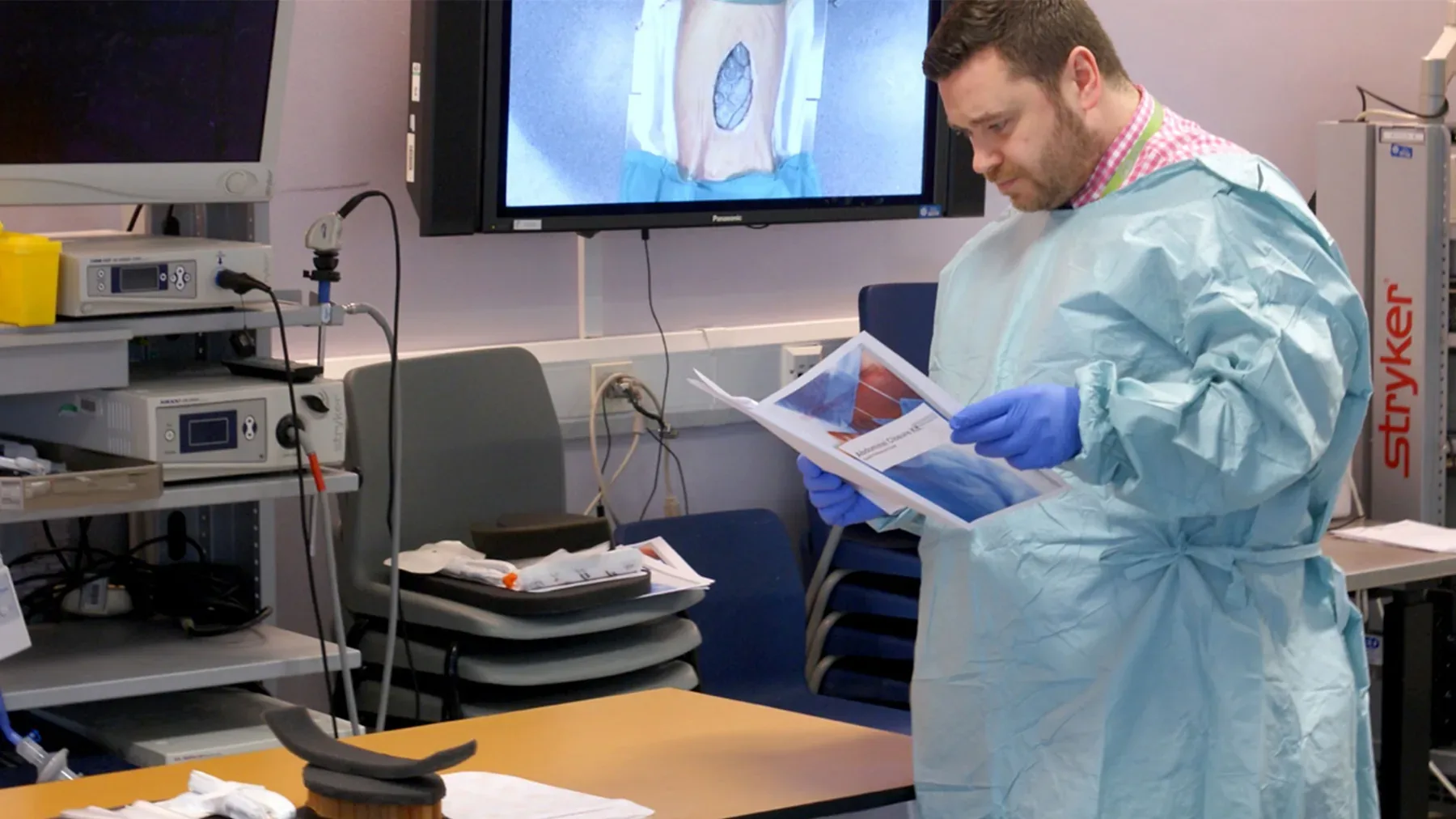 Surgeon reading product instructions during think-aloud protocol